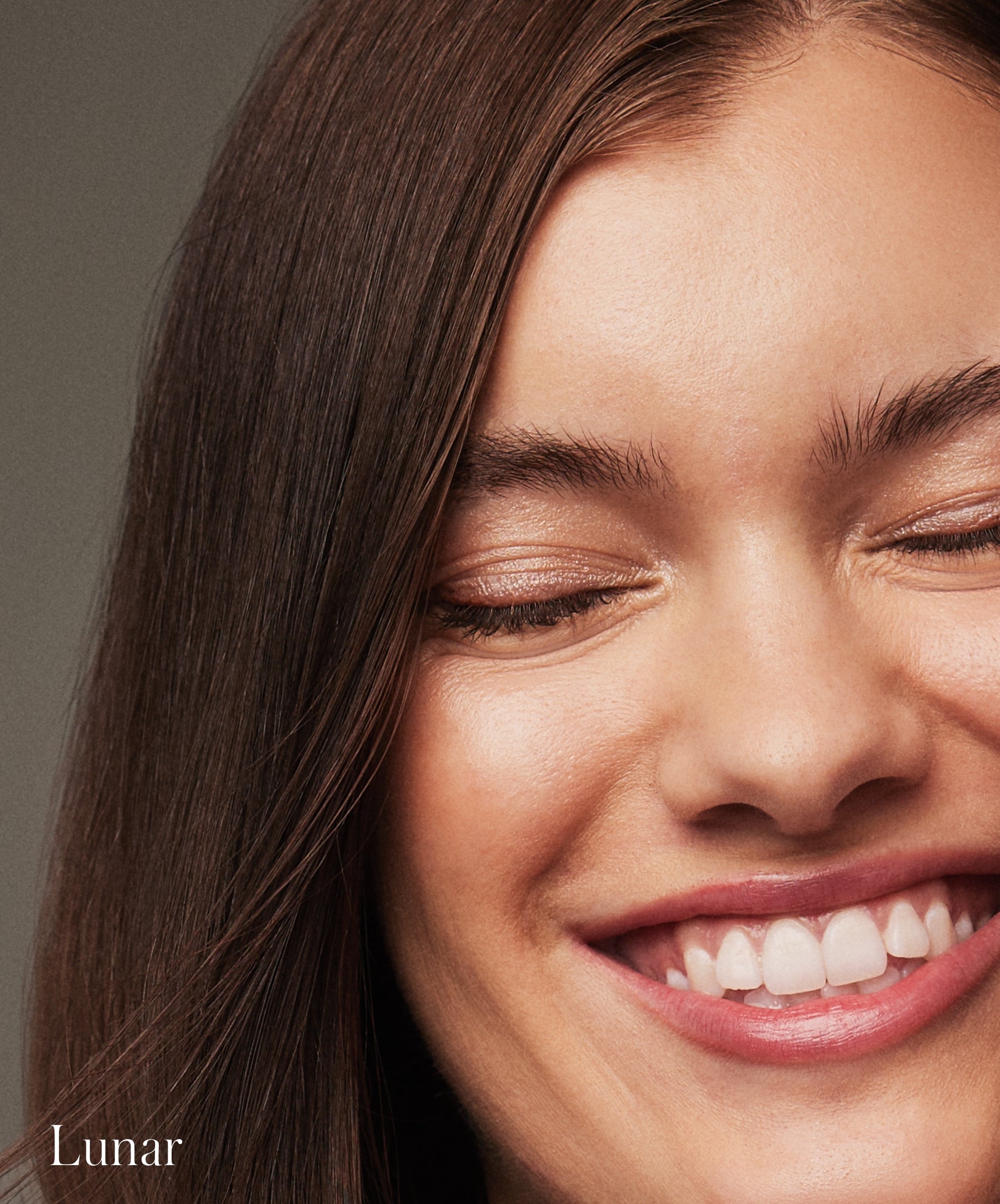 Close-up of model wearing RMS Eye Polish in shade Lunar